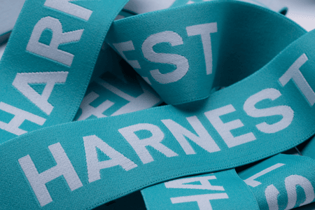 Harnest expands trims platform with regenerated polyester